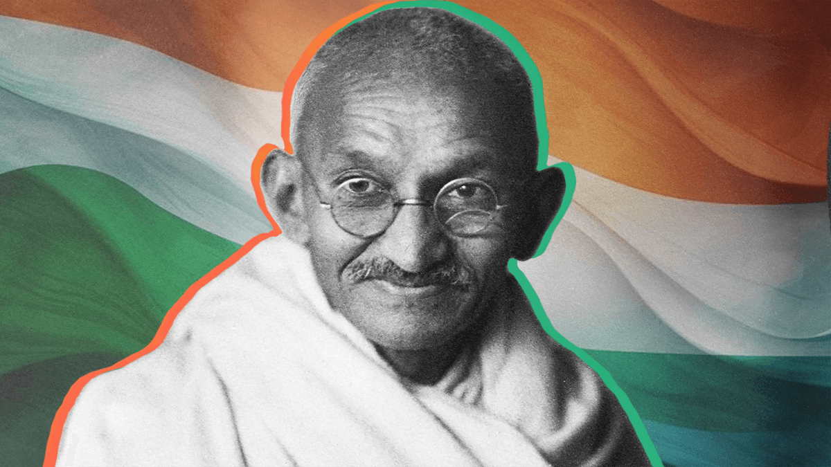 Illustrated portrait of Mahatma Gandhi leading the Salt March with a walking stick, wearing a homespun shawl and surrounded by followers.