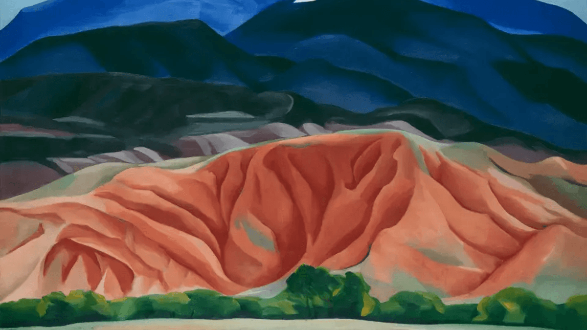 A Georgia O’Keeffe desert landscape with bold shapes, warm colors, and simplified forms that evoke the vastness of New Mexico.