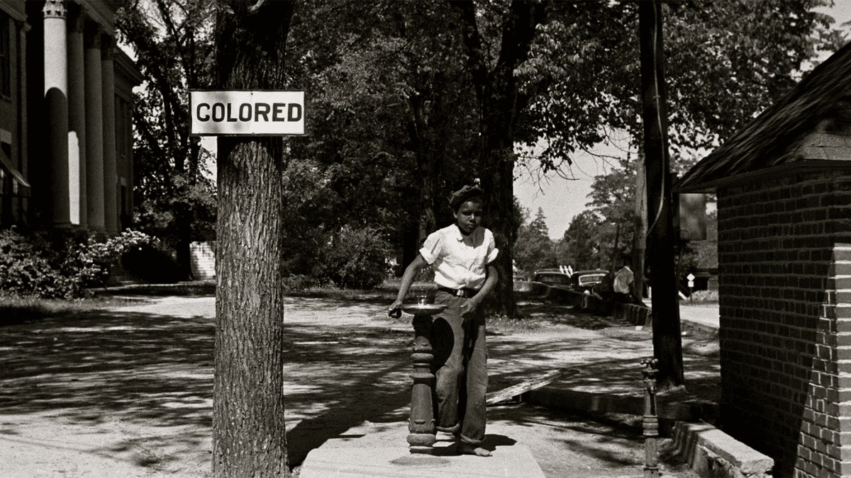 In the late 19th century, southern states codified racial segregation and voter suppression through Jim Crow laws.