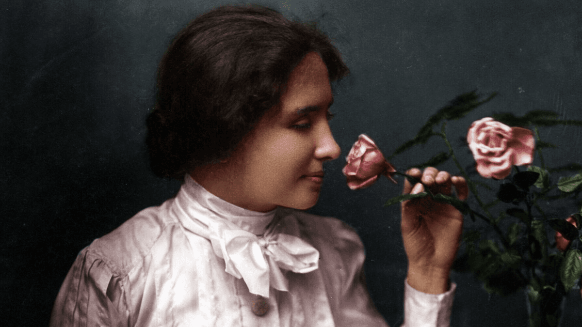 Illustrated portrait of Helen Keller reading Braille with one hand while holding a book in the other, surrounded by symbols of education and justice.